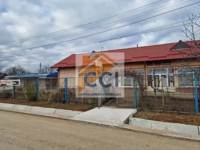 Se oferă spre vânzare / închiriere clădire cu spațiu comercial - foto 24