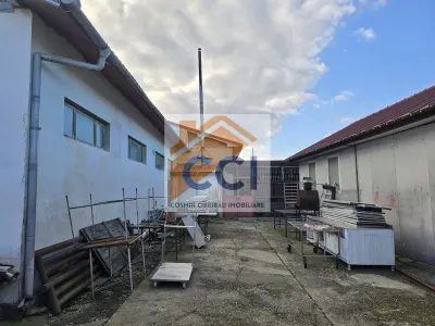 Se oferă spre vânzare / închiriere clădire cu spațiu comercial - foto 9