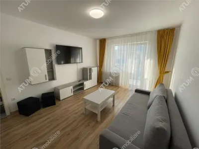 De inchiriat apartament cu 2 camere decomandate balcon si loc parcare in zona Magnolia din Sibiu - foto 2