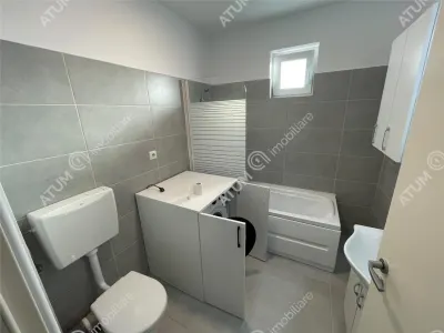 De inchiriat apartament cu 2 camere decomandate balcon si loc parcare in zona Magnolia din Sibiu - foto 9