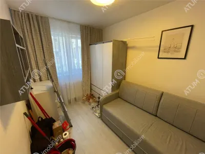 De inchiriat apartament cu 3 camere decomandate si balcon inchis in zona Strand din Sibiu - foto 6