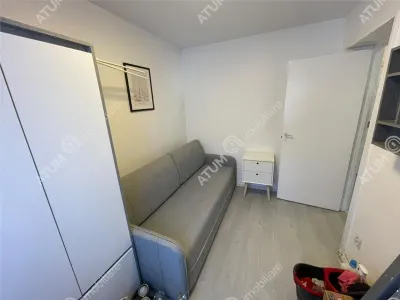 De inchiriat apartament cu 3 camere decomandate si balcon inchis in zona Strand din Sibiu - foto 7