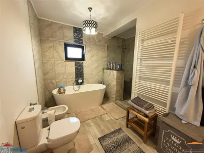 Vila impunatoare cu 6 camere spatioase in stil american - foto 28