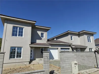 Duplex 5 camere - despartit prin garaj - teren generos - Mosnita Veche