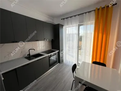 De inchiriat apartament 2 camere decomandate balcon loc propriu de parcare situat in Selimbar Sibiu - foto 6