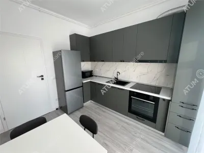 De inchiriat apartament 2 camere decomandate balcon loc propriu de parcare situat in Selimbar Sibiu - foto 7