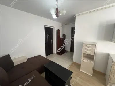 De inchiriat garsoniera decomandata la etajul 1 si loc de parcare zona Turnisor - foto 11