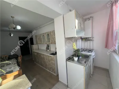 De inchiriat garsoniera decomandata la etajul 1 si loc de parcare zona Turnisor - foto 4