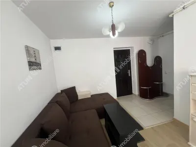 De inchiriat garsoniera decomandata la etajul 1 si loc de parcare zona Turnisor - foto 10