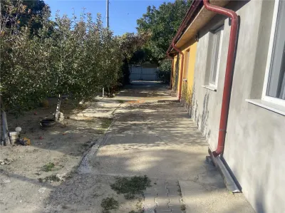 Casa de vanzare in sat Tataranu cu suprafata de 118 mp , teren 1287 mp, constructie moderna , mobilata complet - foto 2