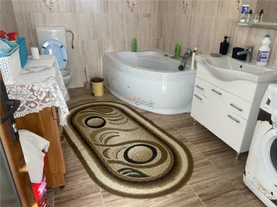 Casa de vanzare in sat Tataranu cu suprafata de 118 mp , teren 1287 mp, constructie moderna , mobilata complet - foto 11