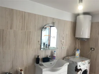 Casa de vanzare in sat Tataranu cu suprafata de 118 mp , teren 1287 mp, constructie moderna , mobilata complet - foto 12