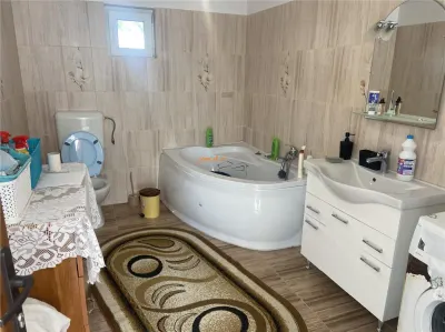 Casa de vanzare in sat Tataranu cu suprafata de 118 mp , teren 1287 mp, constructie moderna , mobilata complet - foto 10