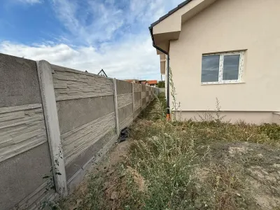 Duplex pe parter de vânzare în Moșnița Nouă, teren generos - foto 6