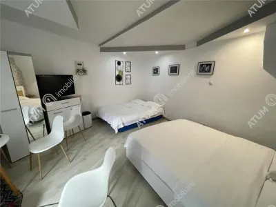 De vanzare garsoniera la casa si curte comuna in zona ultracentrala din Sibiu - Sibiu